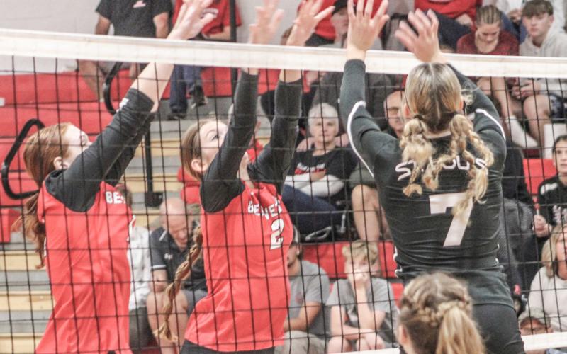 A St. Louis hitter tries to tip the ball out of the reach of the Beaverton blockers Ava Nickel and Bryar Pollard during the Beavers victory last Wednesday night.