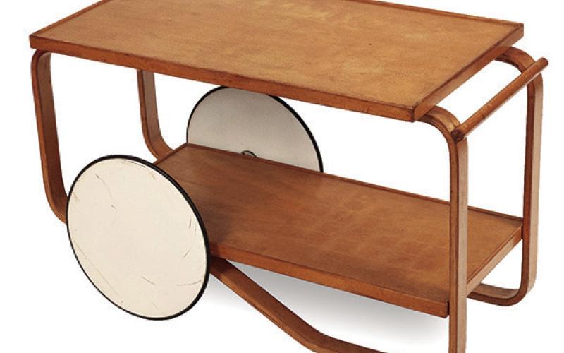 Scandinavian modern design gives an Artek tea trolley a sleek, stylish look. KOVELS.COM