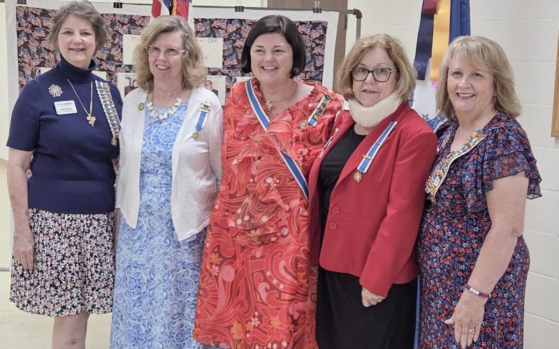 DAR members Ellen Fuller and Kathy Brown were recognized in a Vietnam Commemoration Pinning Ceremony. Pictured from left to right: Carol Dunn, Kathy Brown, Dawn Brady, Ellen Fuller, and Camille Subject.