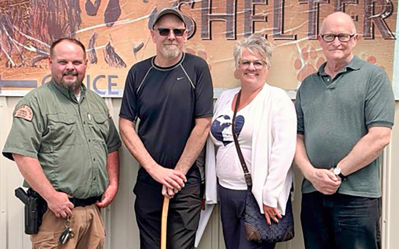 Jim Maveal, Dan Stahl (estate executor), Dana Stahl (niece of Gayla) and Fred Hanchett (son of Gayla) pose together for a check presentation from the estate of Gayla Jacobson to the Gladwin County Animal Shelter.