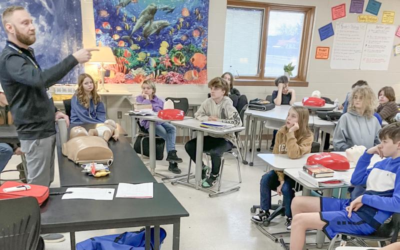 Zach Krahner, a former paramedic and current Community Health Educator for My Michigan Health teaches life saving techniques to Beaverton seventh graders.