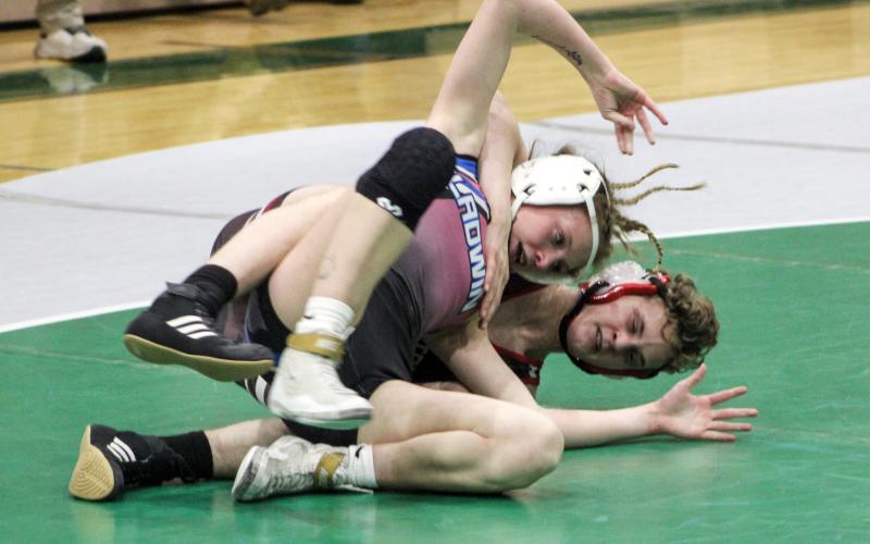Beaverton’s Eric Larson gains control during a match with Gladwin’s Tricia Pyrzewski. Larson was First Team All-Conference and Pyrzewski Second Team.