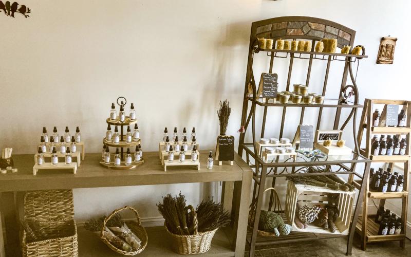 Many different products derived from lavender are on display at the Greenwood Lavender Ranch Boutique at 207 W. Cedar Ave., which is owned by the Greenwood family (inset). GLADWIN
