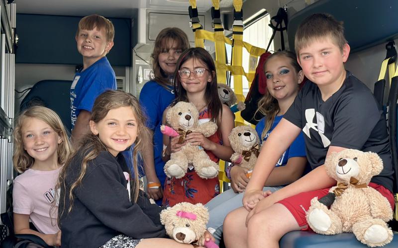 A tour of a real ambulance gives Health Occupations campers a closer look at emergency medical services.