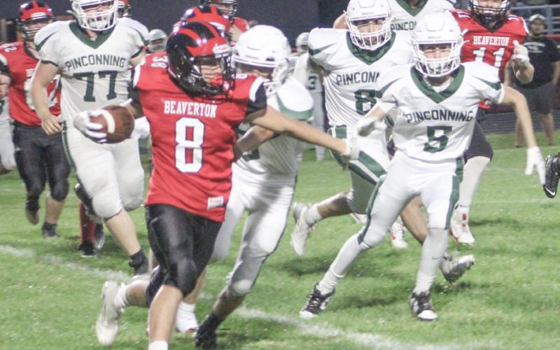 Beaverton’s Caiden Loar turns the corner and heads upfield during Friday night’s loss to visiting Pinconning.