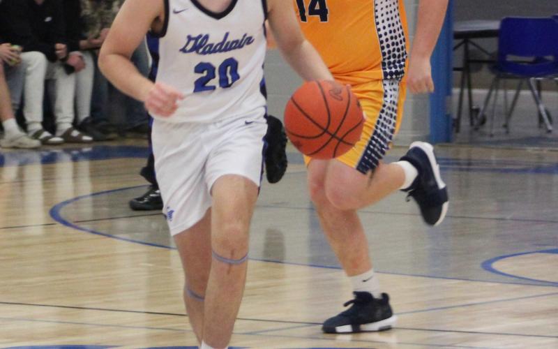 Gladwin’s Brody Verellen races into the front court during last Wednesday night’s victory over Shepherd.