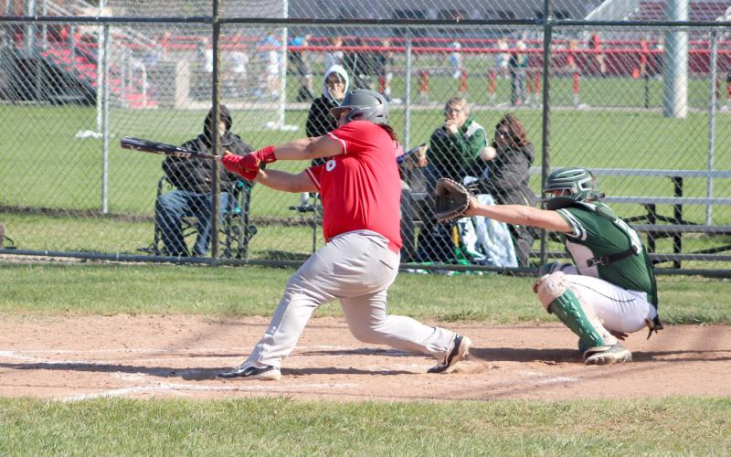 Beaverton slugger Leland Love punishes a pitch during a game last season. The junior is one of several returning starters who will be in the lineup this spring.