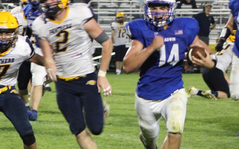Gladwin’s Preston Willert turns the corner and heads for the end zone during Friday night’s win over Standish-Sterling.