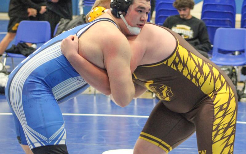 Gladwin’s Nick Brasseur was the heavyweight champion Saturday when he won it all at 285 at the Mio Thunderbolt Invitational.