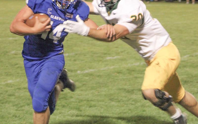 Turnovers costly in Gladwin football opener