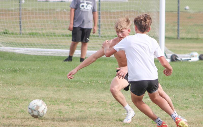 Brady Demory, one of just three seniors who have returned to the roster this season, makes a move at the first practice for the Gladwin soccer team Monday.