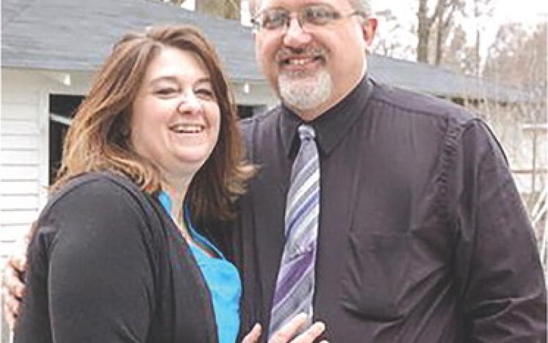 Gladwin Area Community Band director Ed Falls (right) and his wife Tammy Falls (left).