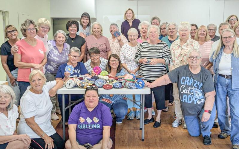STITCHERS AND QUILTERS GATHER