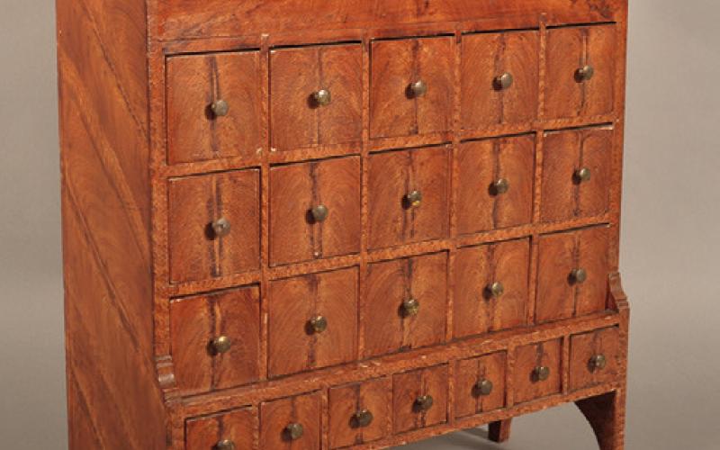 This seed chest was made about 1870 out of inexpensive wood for a practical purpose. Now it can command a higher price than some designer pieces.