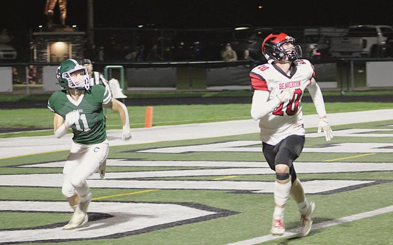 Beaverton’s Ian Roberts zeroes in on a pass during a game at Clare last season. Roberts returns to the lineup for his senior campaign Friday night at Evart.