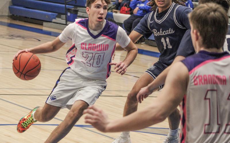 Brody Verellen and his teammates wore special uniforms to defeat Bay City John Glenn during last Monday’s Coaches Vs. Cancer game.