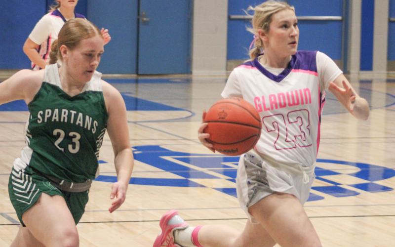 Liz Winchester sports a new outfit as she takes it to the hole during last week’s Coaches Vs. Cancer game against Pinconning.