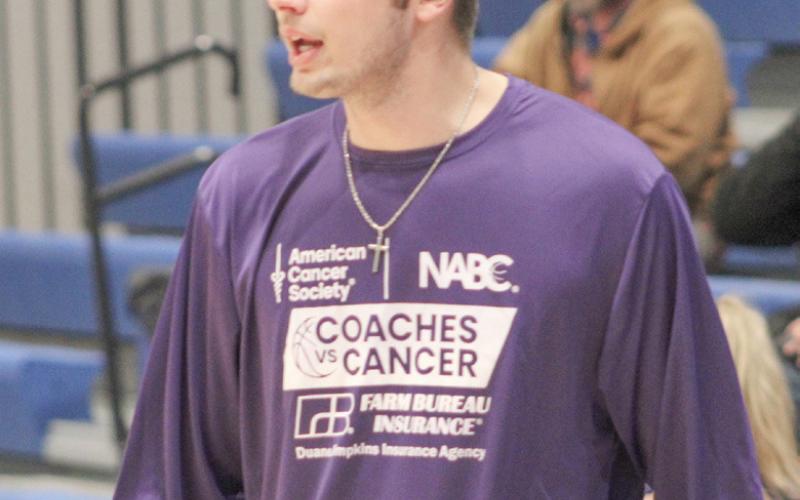 Gladwin varsity boys’ coach Mike Verellen and girls’ coach Nic Taratuta had special shirts made to work the sidelines during last week’s games.