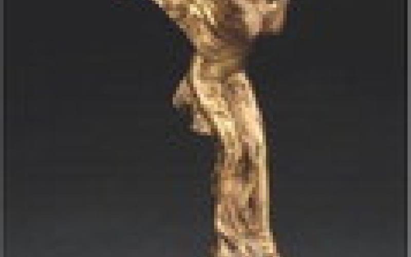 The Spirit of Ecstasy, nicknamed the Flying Lady or Silver Lady, has decorated Rolls-Royce cars since 1911. This figure is a brass reproduction. KOVELS.COM