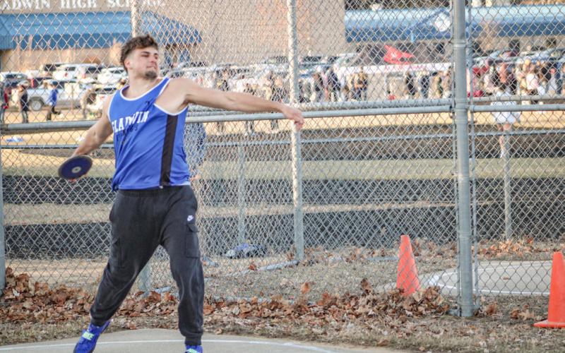 Gladwin’s Harvey Grove competes in the discus at last Wednesday’s Jack Pine Conference opener. Grove placed third in the disc and second in the shot put.