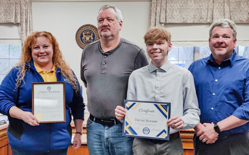 Pictured are Sarah Kile, John Caffrey, Daniel Brewer, and John Clayton. PHOTO PROVIDED BY KAREN SEKRENES