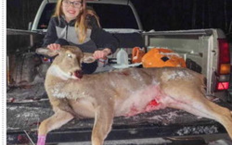 Nevaeh Lewis, age 9, of Beaverton, shot her first deer while hunting with her dad Zak.