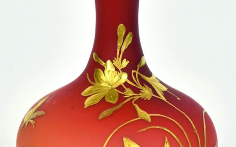 When it comes to decorations on Victorian art glass, more is always better. This vase by Thomas Webb &amp;amp; Sons has the shaded color scheme called peachblow, a satin finish, and gold flowers and butterflies.