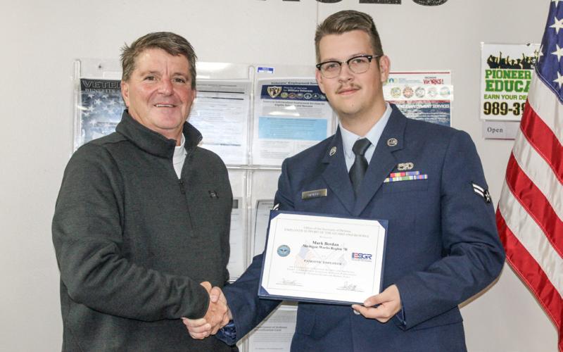 Pictured are Michigan Works! Region 7B Executive Director Mark L. Berdan and PATH Coordinator Airman 1st Class Hauk DeGeer. Michigan Works! Region 7B is proud of Hauk’s service, and our role in supporting him.