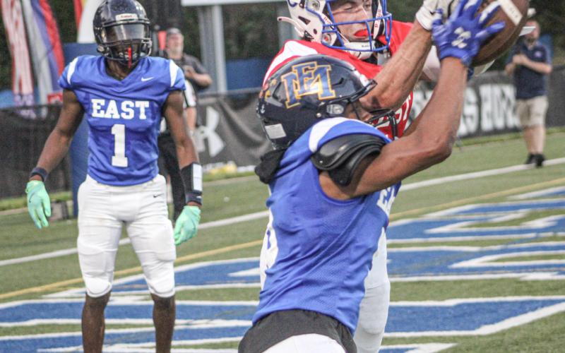 Gladwin’s Trace Corlew breaks up a pass at the goal line during the third quarter of the Michigan High School Football Coaches Association East-West All-Star Game Saturday at Lawrence Tech University in Southfield.