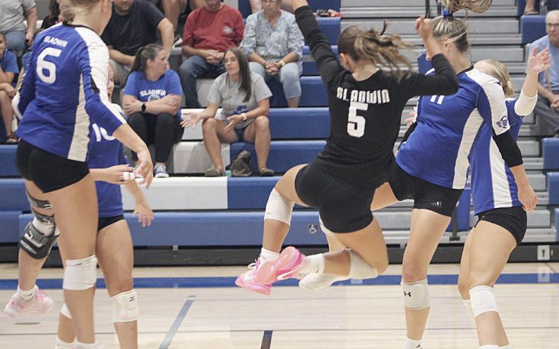 A service ace results in a celebratory dance for the Gladwin volleyball team during last week’s win over Tawas.
