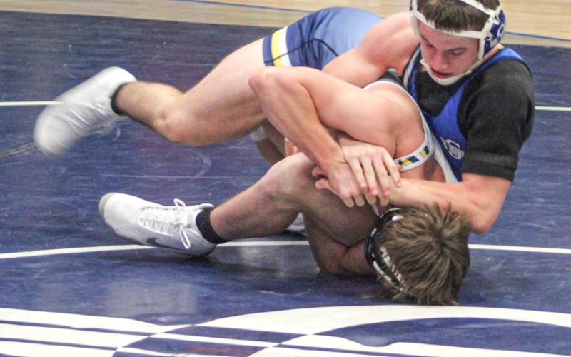 Gladwin’s M.J. McDonald got a grip on a silver medal at 144 Saturday at the Northern Michigan Championships in Gaylord.