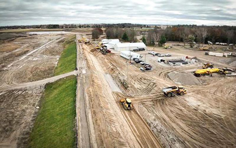 Pictured is the Edenville Dam under construction. PHOTO PROVIDED BY FISHER CONTRACTING COMPANY