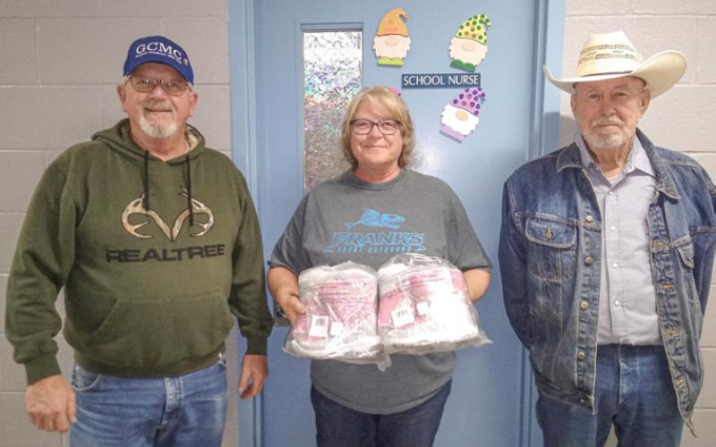 The Gladwin Christian Men’s Club donate boots