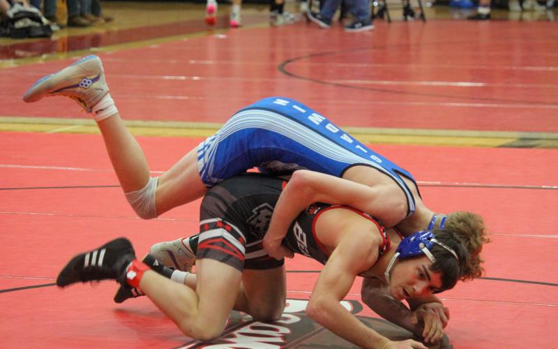 Flying G’s wrestling family, productive in Conference Finals