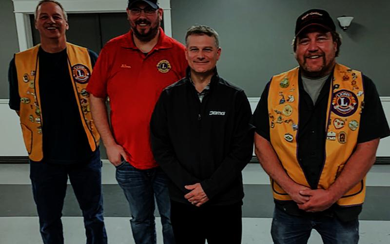 Pictured, left to right, are Lion, Craig Wolfe; new member, Allen Grove; new member, Brian Keeley; and Lion, Bob Killian.
