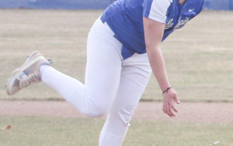 Gladwin’s Brayden Dee follows through after a pitch Thursday against Pinconning.