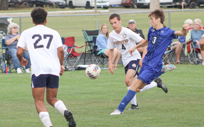 Gladwin’s Marcus Wagnitz draws a bead on a bouncing ball during Monday’s victory over Shepherd in the home opener for the Flying G’s.