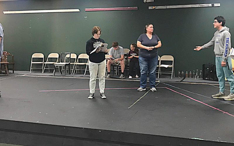 An early Fiddler On The Roof rehearsal. Pictured left to right are: Steve Levine (Tevye), Mady Crawford (Tzeitel), Monika Pfannes (Golde), Garry Farley (Fyedka), and Marnie Stearns (Chava).