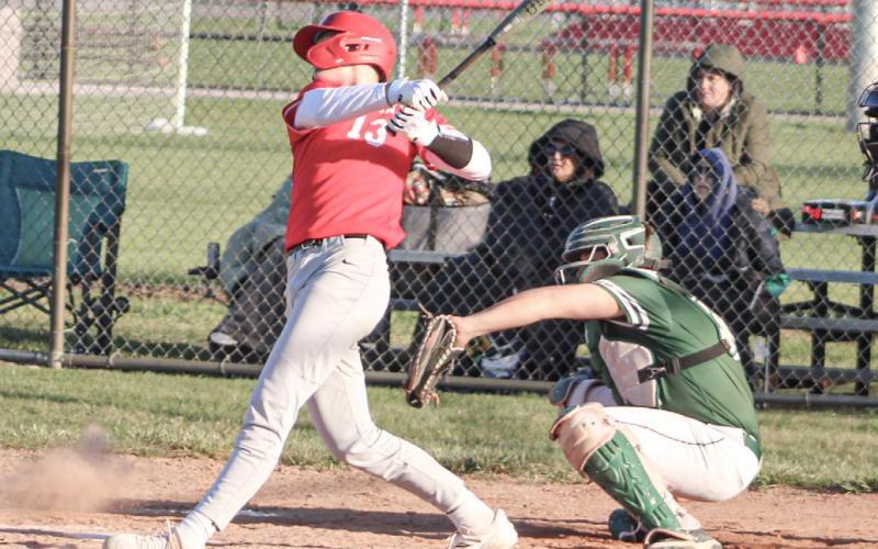 Beaverton’s Ian Roberts gets a hit during Thursday’s doubleheader with Pinconning.