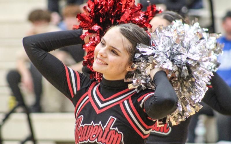 Beaverton’s pom pon squad celebrated the tip off of the basketball season last Tuesday night with a halftime performance and Sophia Swinson was all smiles.