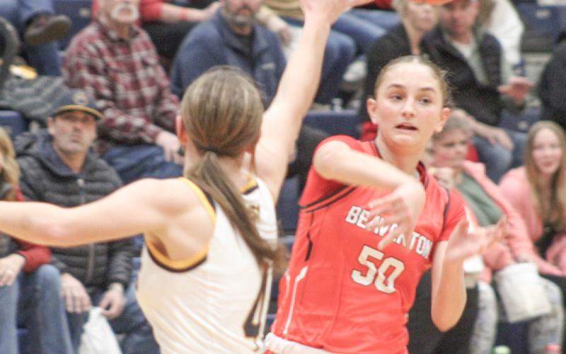 Beaverton’s Myah Hubble fires a pass right through the defense during Friday night’s 58-47 victory at Standish in a meeting of the top two teams in the Jack Pine Conference.