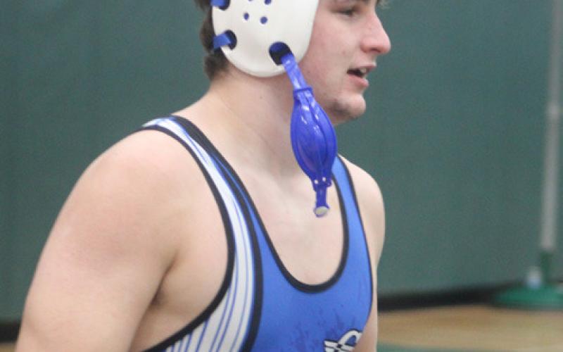 Gladwin’s Harvey Grove leaves the mat after winning the JPC title at 215.