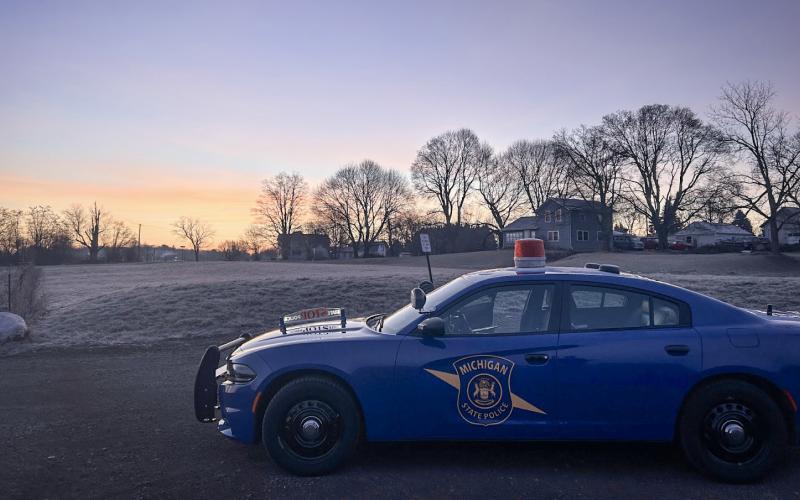 Trooper David Versin parks his patrol car in Crandell Park in Charlotte, which he said is a nighttime hangout where local teenagers sometimes go drinking.