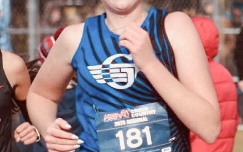 Gladwin’s Alanis Povey races to a spot at the state meet with a personal best time at the Division 2 regional Saturday at Benzie Central.