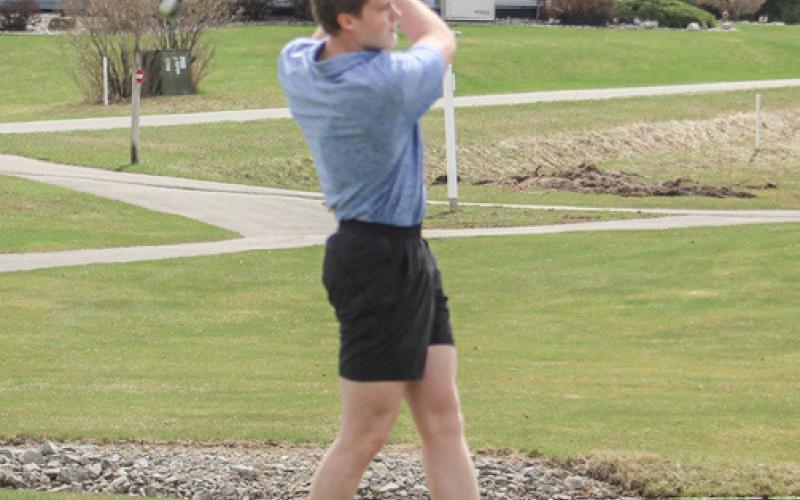 Gladwin’s Clay Newman tees off during a recent match. Newman led the Flying G’s with a 46 last Tuesday.
