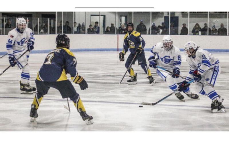 Gladwin opens hockey season with big win