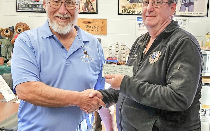 Pictured left to right: Gary Downie, Treasurer, Big Boys Club of Gladwin County, and Ken Roberts, Director of the Gladwin County Veterans Affairs Office.