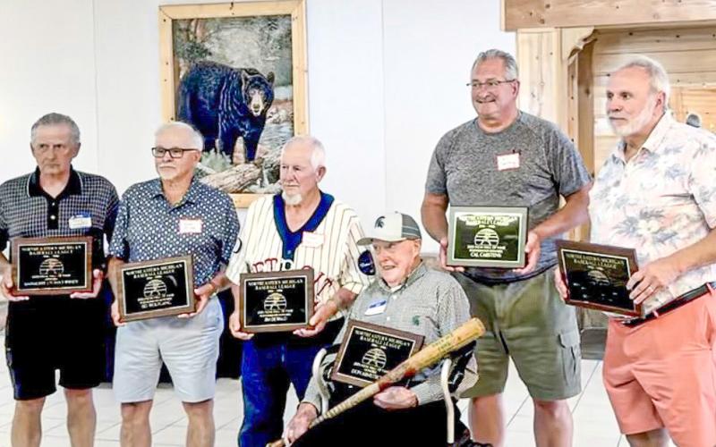 NEM Hall of Fame Baseball Inductees for 2025, are pictured left to right: Tony Windt, Gary Ozier (accepting posthumous award for Sid Wolfgang, Frank Gawlik (accepting posthumous award for Jim DeWalt), 97-year-old Don Armstrong with bat and plaque, William J. Carstens III accepting posthumous award for Cal Carstens, and Joe Pilot. PHOTO PROVIDED BY JACKIE CARSTENS