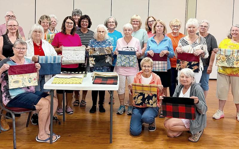 STITCHERS GATHER FOR SERVICE PROJECT