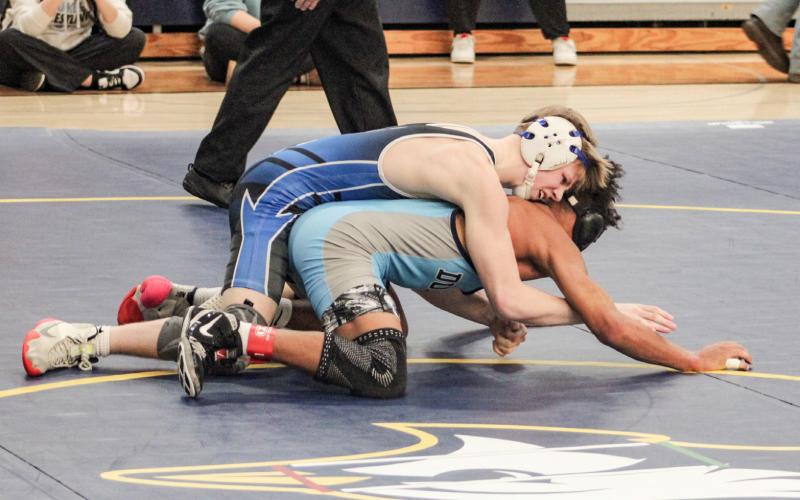 Gladwin’s Brady Demory battled his way to a 5-4 victory in the final at 120 Saturday at Shepherd to win a district title and advance to the regional.